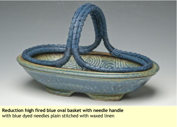 Reduction high fired blue oval basket with needle handle with blue dyed needles plain stitched with waxed linen