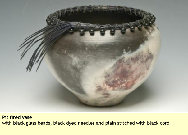 Pit fired vase with black glass beads, black dyed needles and plain stitched with black cord