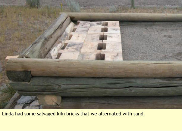 Linda had some salvaged kiln bricks that we alternated with sand.